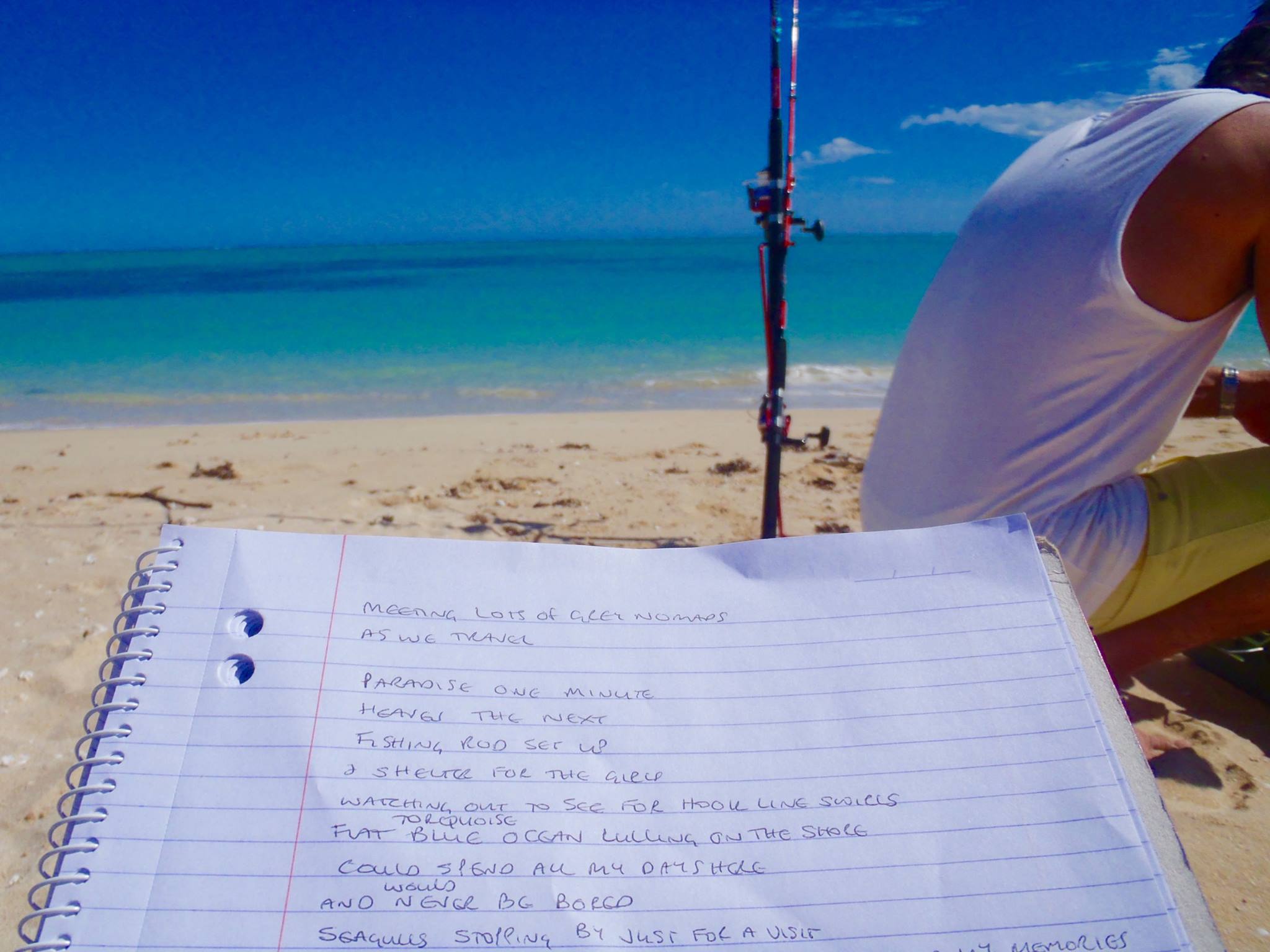 writing saphrosyne beach with book  .jpg